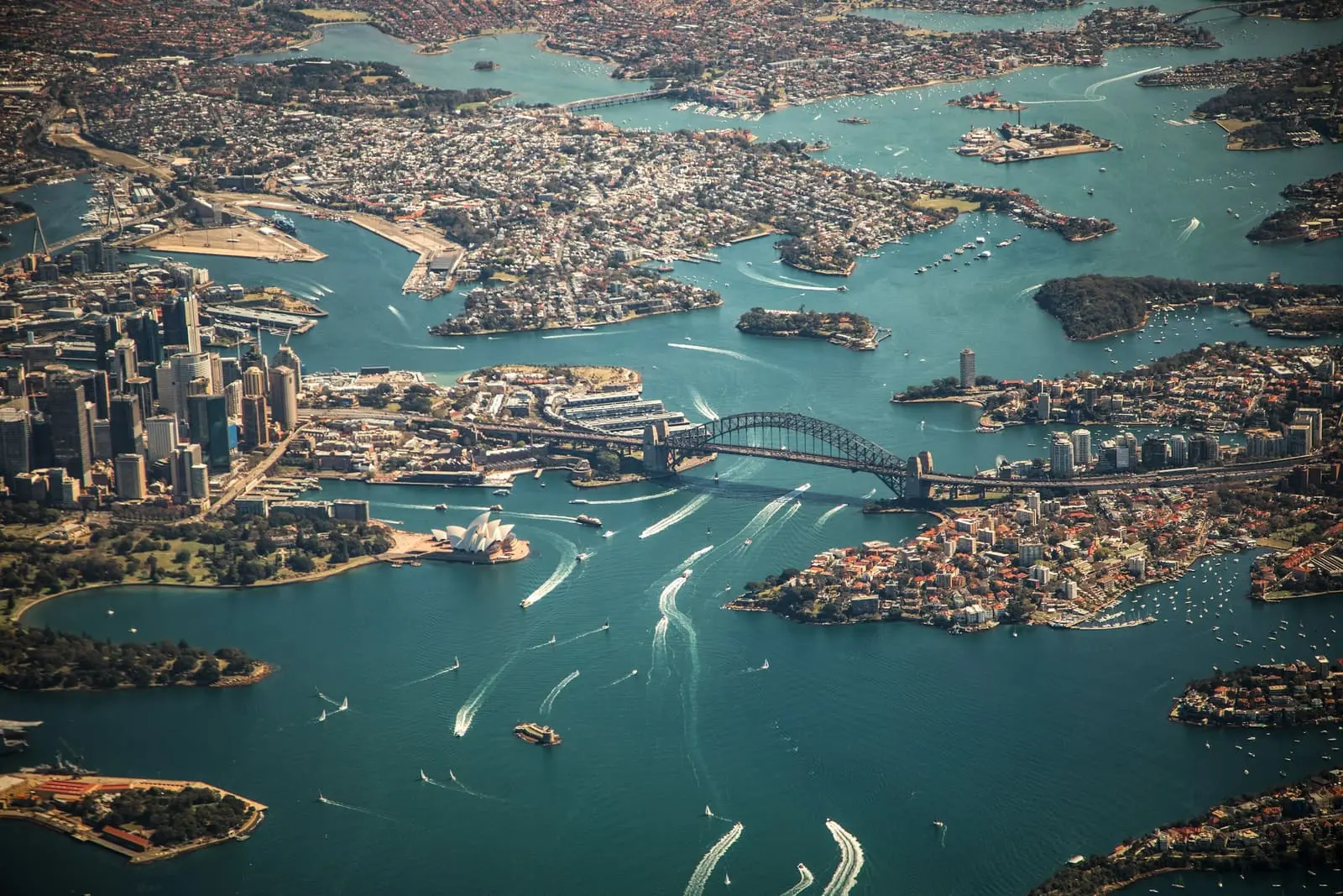 Aerial view of Sydney Harbour with the Harbour Bridge and the Opera House