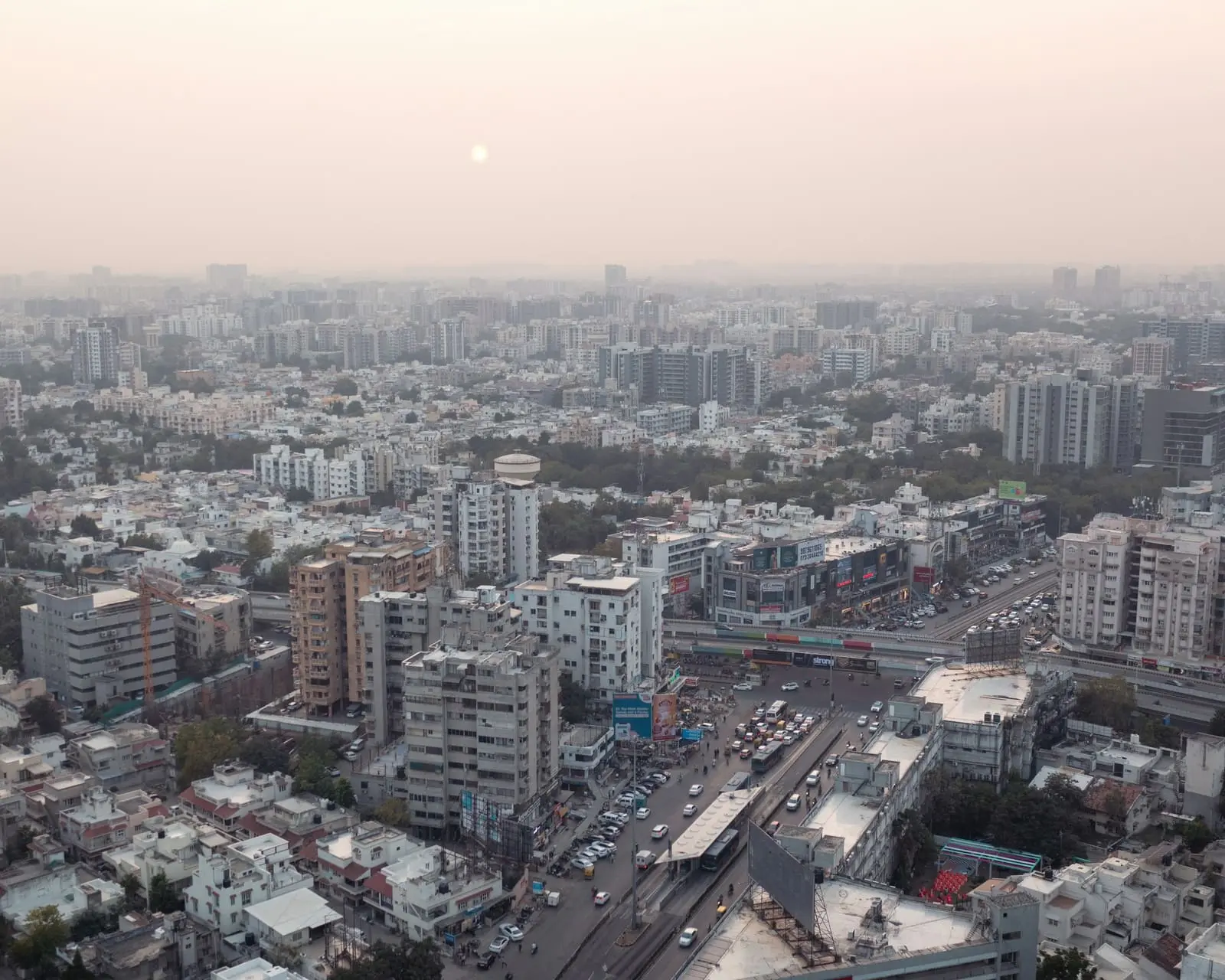 Aerial view of Ahmedabad's dense skyline in soft morning haze